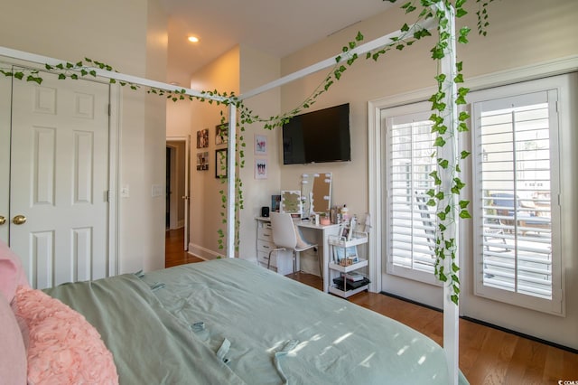 bedroom featuring wood finished floors