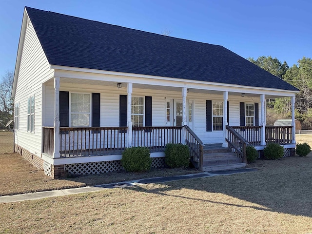 view of front of house with covered porch, crawl space, and roof with shingles