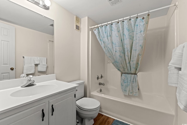1000 N Waccamaw Dr Unit 205, Murrells Inlet, SC 29576 - full bath featuring shower / bath combo with shower curtain, visible vents, wood finished floors, and vanity
