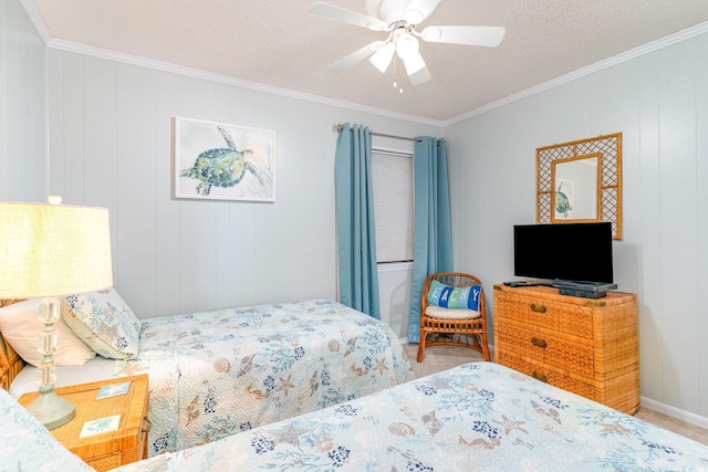 bedroom with ornamental molding, carpet flooring, a textured ceiling, and a ceiling fan