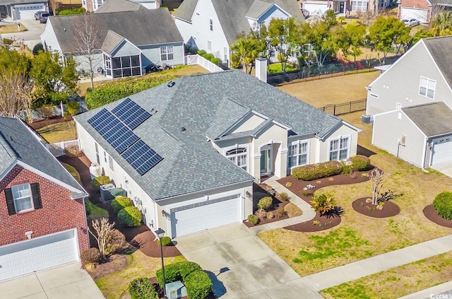 drone / aerial view with a residential view