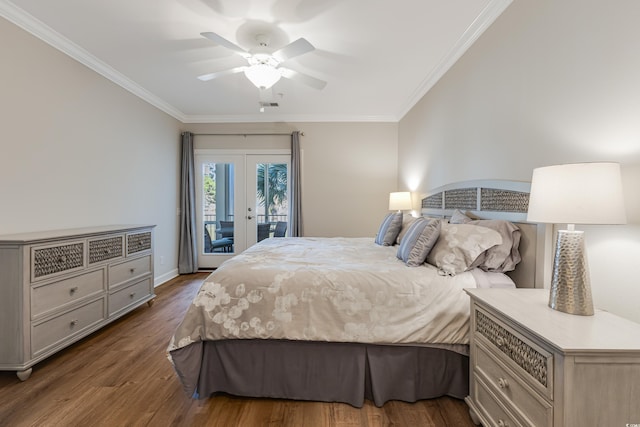 bedroom with access to exterior, crown molding, dark wood-type flooring, and french doors