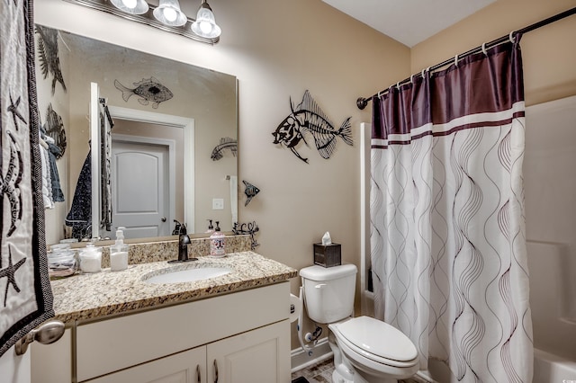 full bath with vanity and toilet