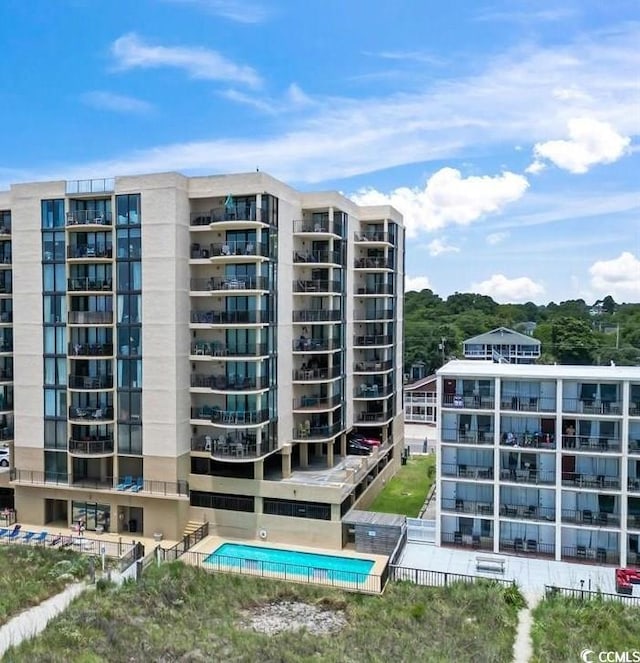 view of property with a community pool