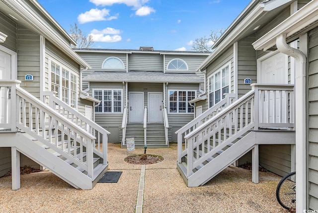 exterior space with entry steps and stairway