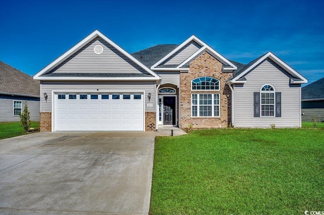 view of front of home with a garage, a front lawn, concrete driveway, and brick siding