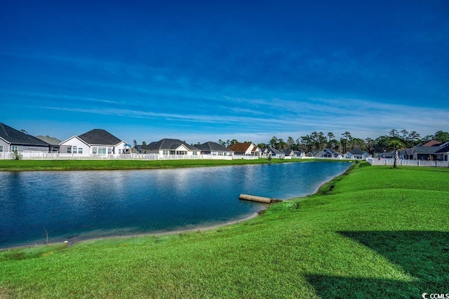 water view with fence and a residential view