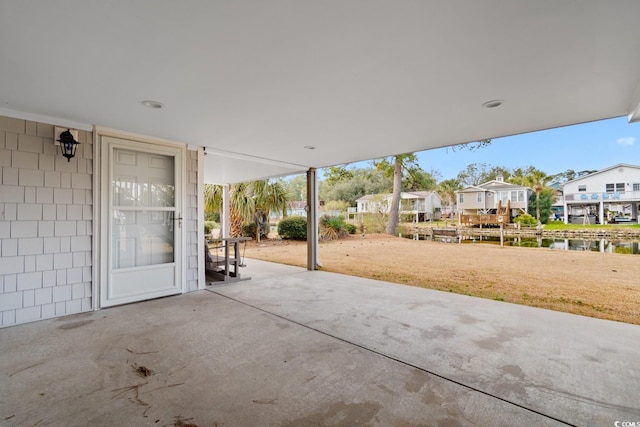 view of patio / terrace featuring a water view