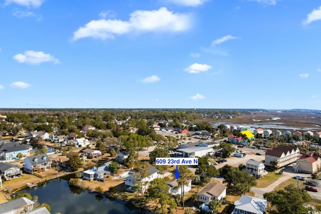 aerial view featuring a water view and a residential view