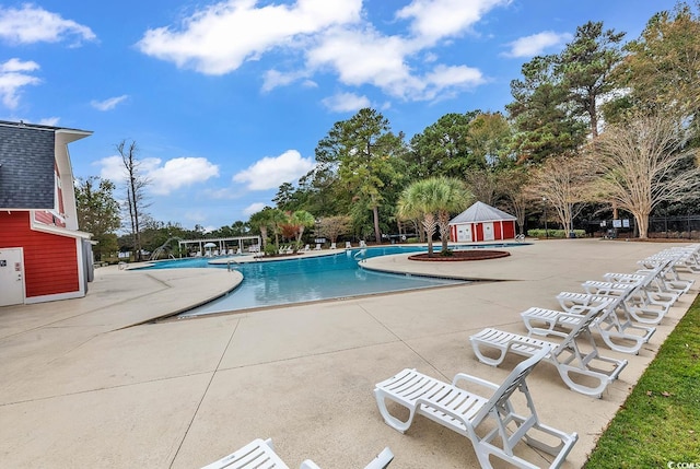 pool with a patio area