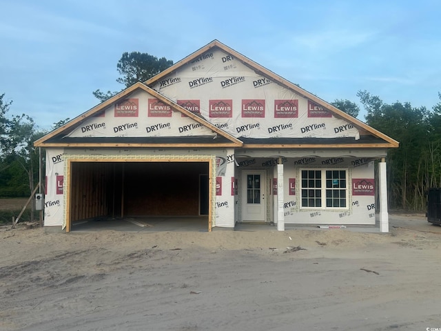 property under construction featuring a garage