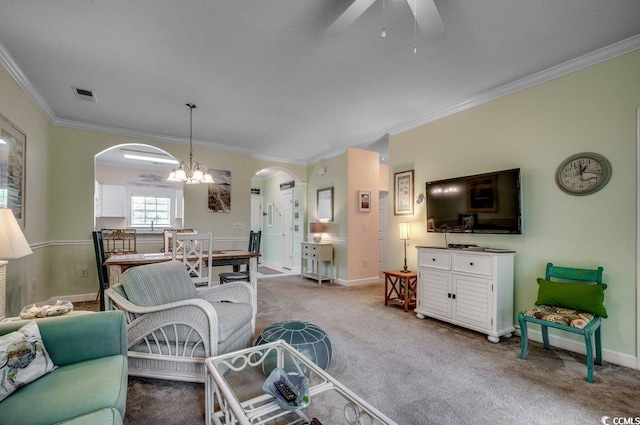 5750 Oyster Catcher Dr Unit 522, North Myrtle Beach, SC 29582 - living area featuring arched walkways, ornamental molding, ceiling fan, a chandelier, and carpet