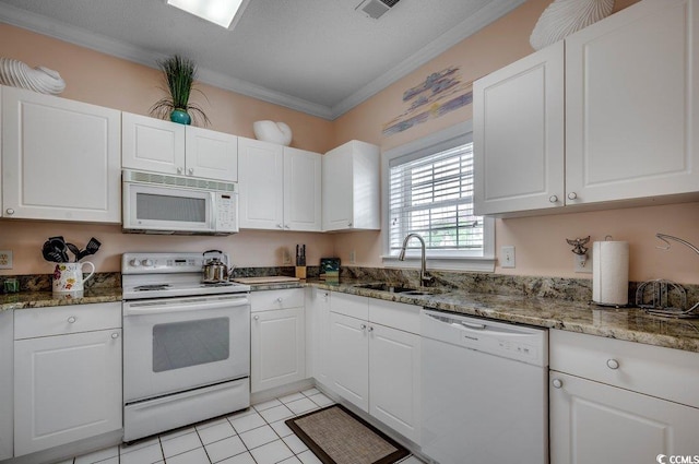5750 Oyster Catcher Dr Unit 522, North Myrtle Beach, SC 29582 - kitchen featuring white appliances, ornamental molding, white cabinets, and stone counters