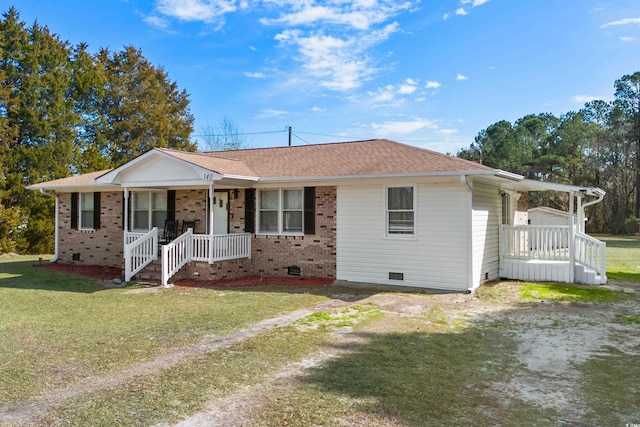 single story home with roof with shingles, crawl space, covered porch, a front yard, and brick siding