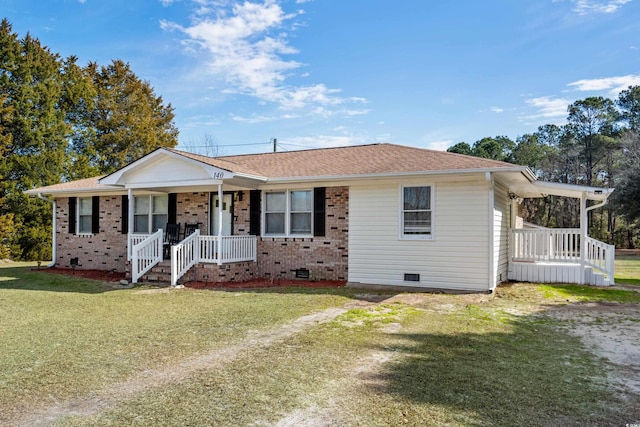 ranch-style home featuring a porch, roof with shingles, crawl space, a front lawn, and brick siding