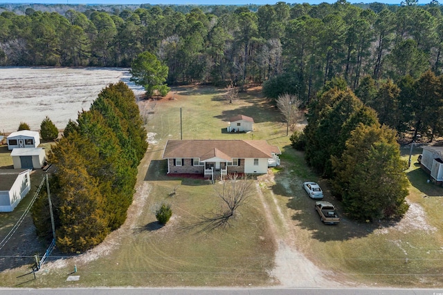 aerial view featuring a forest view