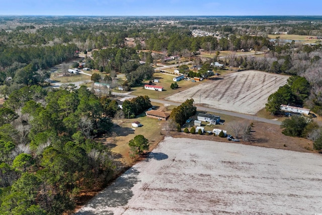 drone / aerial view with a view of trees