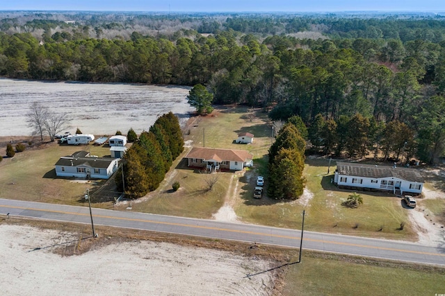 bird's eye view featuring a view of trees