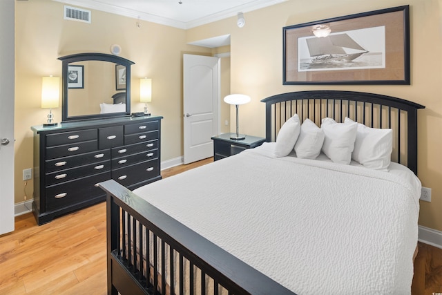 100 N Beach Blvd Unit 1917, North Myrtle Beach, SC 29582 - bedroom with light wood finished floors, ornamental molding, and baseboards