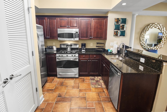 100 N Beach Blvd Unit 1917, North Myrtle Beach, SC 29582 - kitchen featuring stainless steel appliances, a sink, a peninsula, dark brown cabinets, and recessed lighting