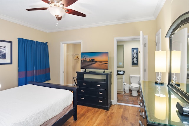100 N Beach Blvd Unit 1917, North Myrtle Beach, SC 29582 - bedroom featuring crown molding, light wood-style flooring, connected bathroom, and ceiling fan
