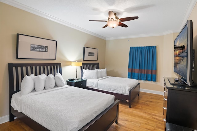 100 N Beach Blvd Unit 1917, North Myrtle Beach, SC 29582 - bedroom featuring crown molding, light wood-style floors, baseboards, and a ceiling fan