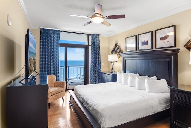 100 N Beach Blvd Unit 1917, North Myrtle Beach, SC 29582 - bedroom with access to exterior, wood finished floors, crown molding, and a ceiling fan