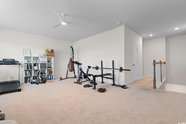 workout room featuring ceiling fan, recessed lighting, baseboards, and light colored carpet