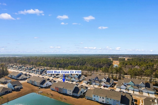 bird's eye view featuring a water view and a residential view