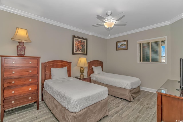 bedroom with baseboards, ornamental molding, a ceiling fan, and wood finish floors