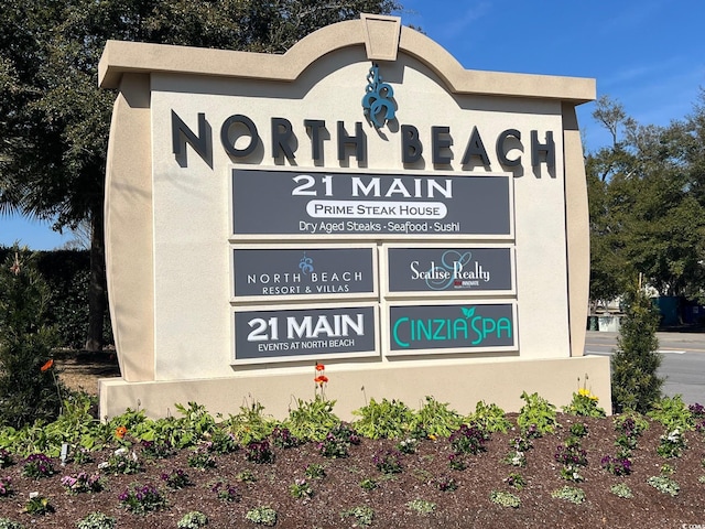 view of community sign