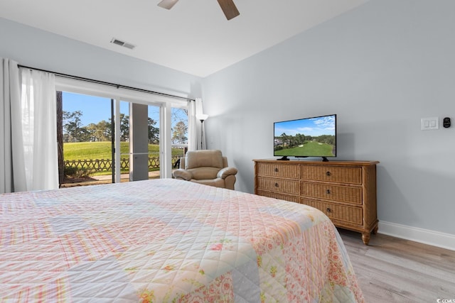 bedroom featuring access to exterior, visible vents, light wood-style floors, ceiling fan, and baseboards