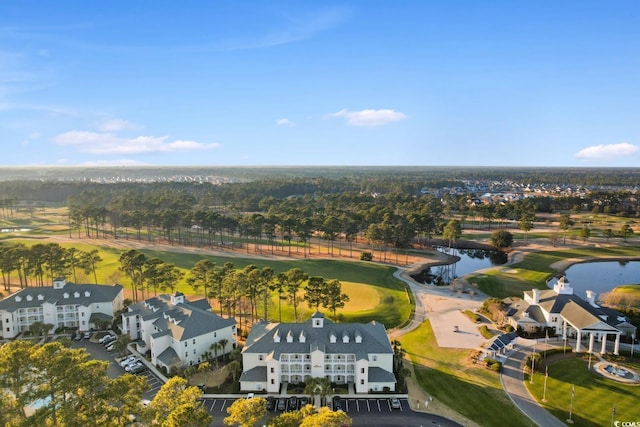 bird's eye view featuring a water view and a residential view