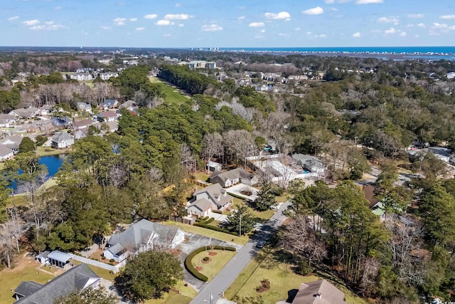 birds eye view of property featuring a water view and a residential view