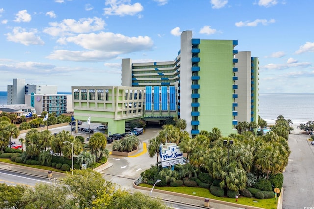 view of building exterior with a water view