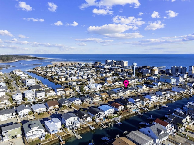 aerial view featuring a water view and a residential view