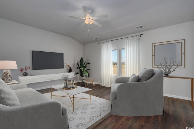 living room featuring baseboards, visible vents, a ceiling fan, lofted ceiling, and wood finished floors