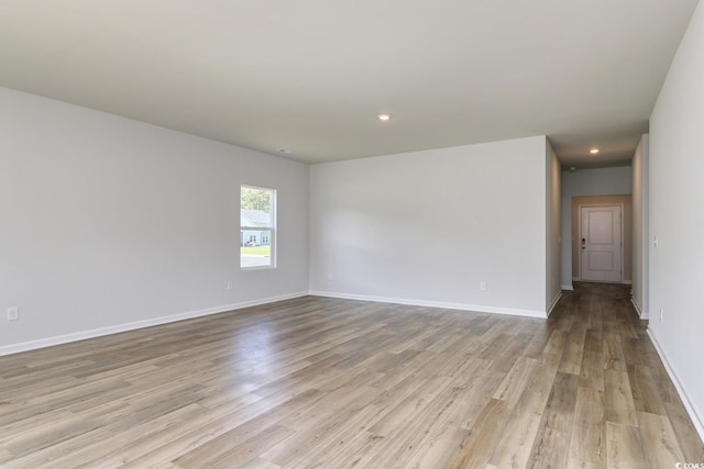 491 Wagner Cir, Conway, SC 29526 - unfurnished room with wood finished floors, baseboards, and recessed lighting