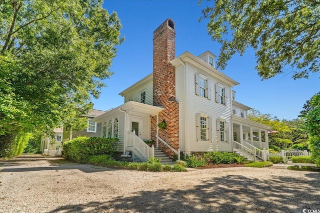 view of property exterior with a chimney