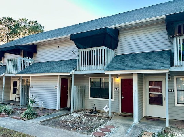 801 Burcale Rd Unit G-5, Myrtle Beach, SC 29579 - townhome / multi-family property featuring a shingled roof and a balcony