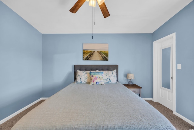 bedroom featuring a ceiling fan, baseboards, and carpet floors