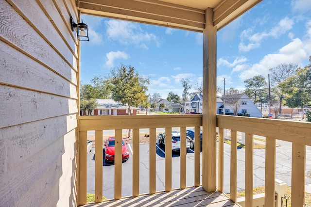 balcony featuring a residential view