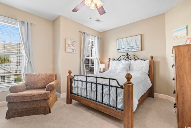 bedroom featuring carpet, visible vents, and baseboards