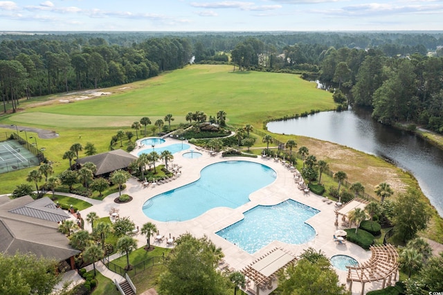 aerial view featuring a water view and a forest view