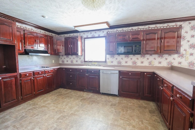 kitchen with a textured ceiling, under cabinet range hood, a sink, black appliances, and wallpapered walls