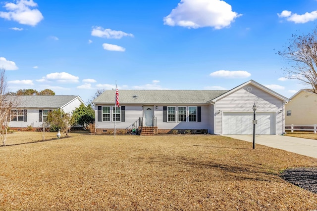 single story home featuring crawl space, driveway, an attached garage, and a front yard