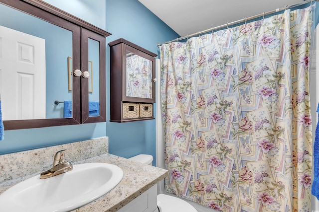 full bathroom with toilet, a shower with curtain, french doors, and vanity