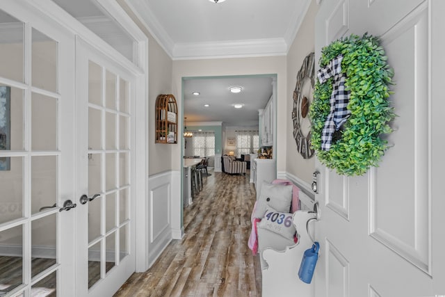 1118 Prescott Cir, Myrtle Beach, SC 29577 - entryway with ornamental molding, french doors, wood finished floors, and a wainscoted wall