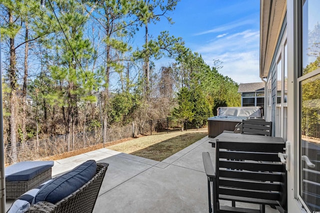 1118 Prescott Cir, Myrtle Beach, SC 29577 - fenced backyard with a hot tub and a patio area