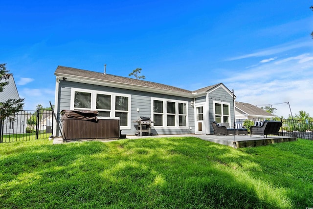 1118 Prescott Cir, Myrtle Beach, SC 29577 - rear view of house with a hot tub and a patio area